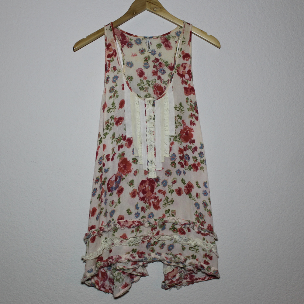 Free People boho top with ruffles.